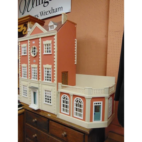 399 - Large wooden doll's house, with extension. 45 x 29 x 16