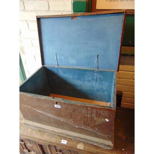 442 - Stained pine trunk having lift up lid and metal side handles. 15 x 28 x 17.5