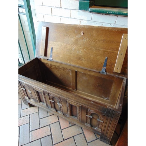 443 - Antique style blanket box, lift up lid, carved panels and on stile supports. 20 x 44 x 17