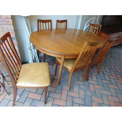 444 - G Plan teak dining suite comprising extending dining table, six chairs and sideboard.