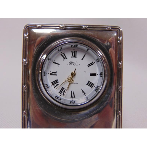 455 - R. Carr England, silver cased miniature travel clock, Sheffield 1995.