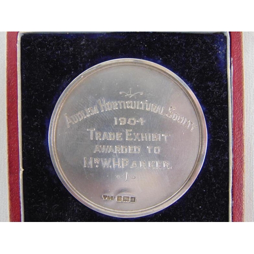 459 - Cased silver medallion, Audlem Horticultural Society 1904 Trade Exhibit - awarded to Mr W.H. Parker.