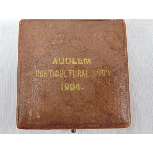 459 - Cased silver medallion, Audlem Horticultural Society 1904 Trade Exhibit - awarded to Mr W.H. Parker.