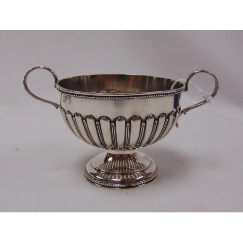 462 - Small silver two handled bowl having gadrooned decoration and on footed base, maker L. Spiers, Birmi... 