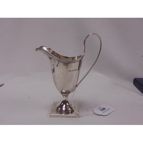 463 - Silver jug on stand having loop handle, maker John Rose, Birmingham 1908.