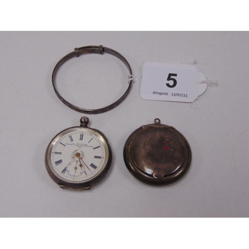 5 - Silver fob watch, silver pill box, and a silver child's bangle.