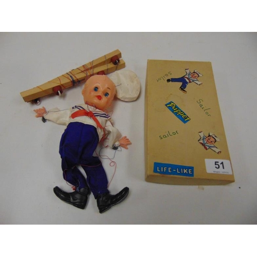 51 - Vintage celluloid sailor puppet