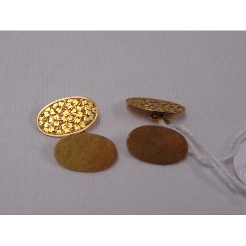 9 - Pair of oval 9ct gold cufflinks, 4.8g.