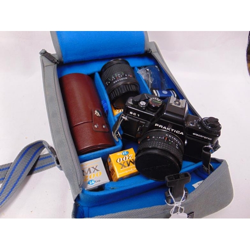100 - Praktica BC1 SLR camera, in bag with accessories.