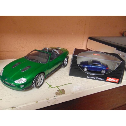 102 - Two scale model cars.
