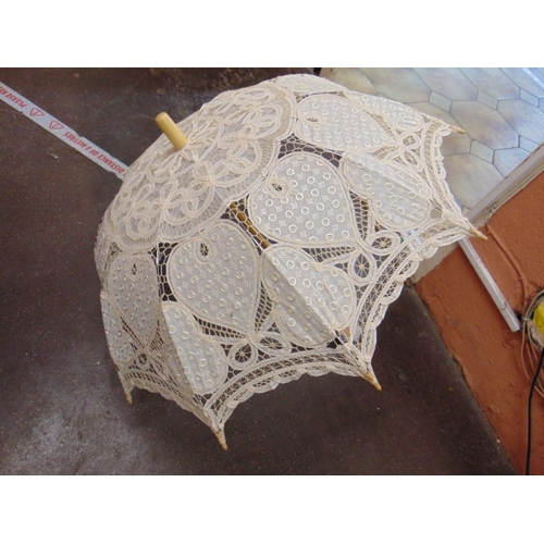 107 - Lace parasol.