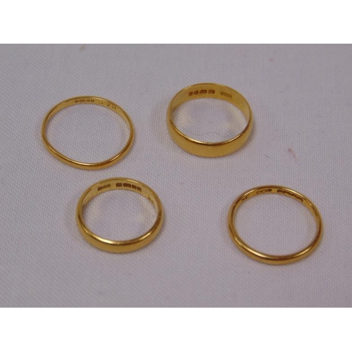 12 - Four 22ct yellow gold wedding bands, 11g.