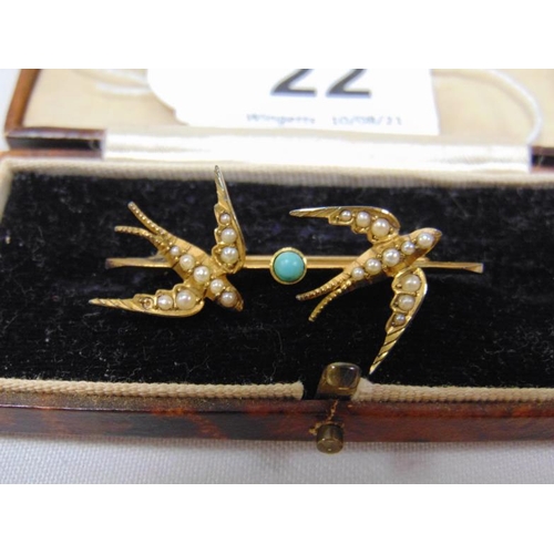 22 - Victorian unmarked yellow gold brooch modelled as two Swallows and set with split seed pearls and tu... 