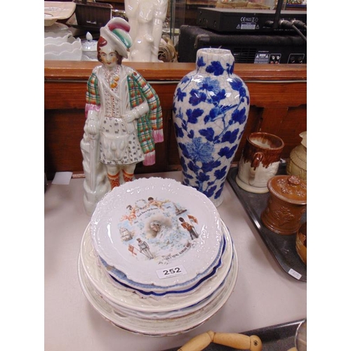 252 - Quantity of antique and later plates, blue and white vase, and a Staffordshire type figure.