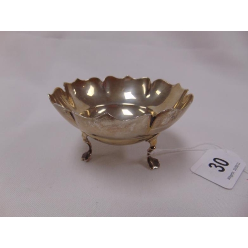 30 - Mappin & Webb circular silver bowl with shaped rim, on three pad feet, London 1907, 3.75