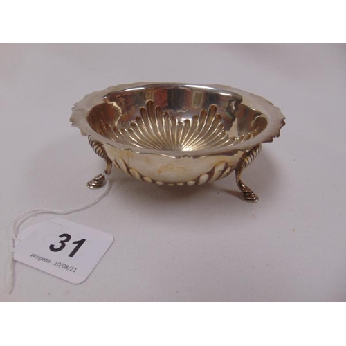 31 - Mappin & Webb circular silver bowl with shaped rim, gadrooned body and on three hoof feet, Sheffield... 