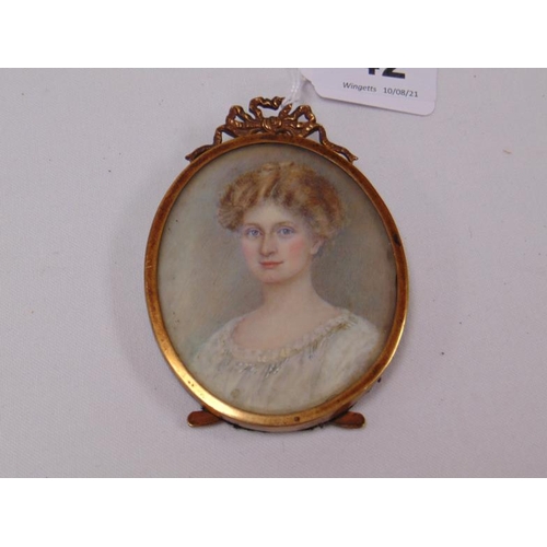 42 - Oval miniature portrait of a young lady, 3.25 x 2.75
