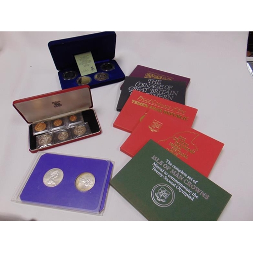 52 - Various mint coin sets.