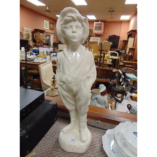 53 - Cream glazed pottery figure, The Whistling Boy, 21
