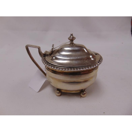580 - Antique large silver mustard pot , having lift up lid , loop handle , gilded interior and on bun fee... 