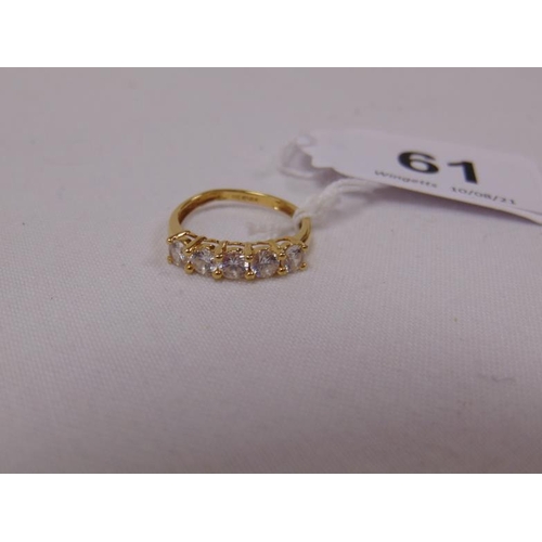 61 - 18ct yellow gold ring set with five white stones, size M, 2.4g.