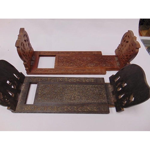 76 - Two carved wooden folding book racks.