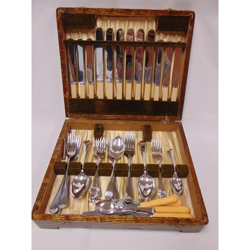 88 - Oak cased canteen of cutlery.