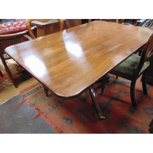 325 - Antique mahogany breakfast table, rectangular tilt top, having rounded corners on baluster turned co... 