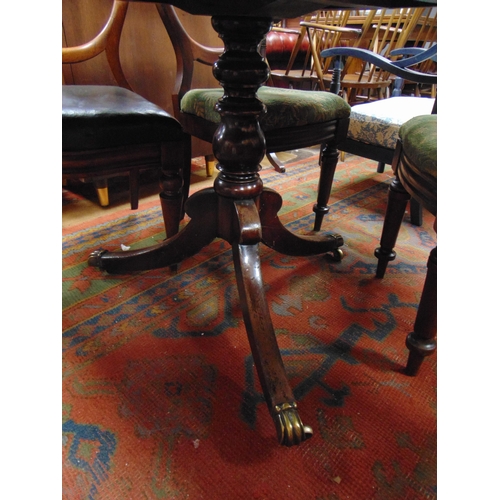 325 - Antique mahogany breakfast table, rectangular tilt top, having rounded corners on baluster turned co... 