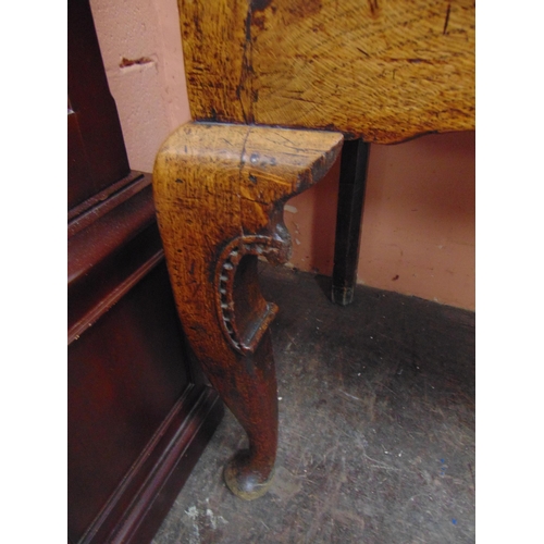 375 - Antique oak Shropshire dresser, plate rack back having ogive cornice, shaped frieze, three shelves a... 