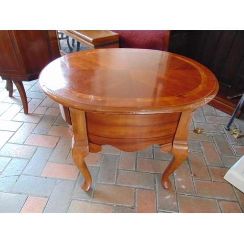 440 - Reproduction oval topped occasional table, having single drawer and on cabriole supports. 22