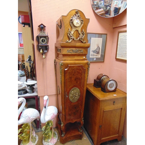 453 - Extremely ornate reproduction walnut cabinet, having applied French clock and gilt metal mounts, sin... 