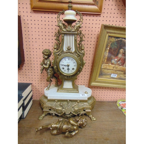 93 - Regnant gilt brass and marble figural mantle clock, 25