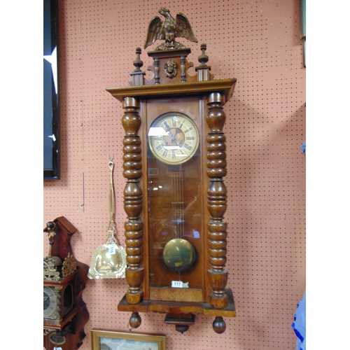 117 - Large walnut cased Vienna type wall clock with eagle pediment, 50