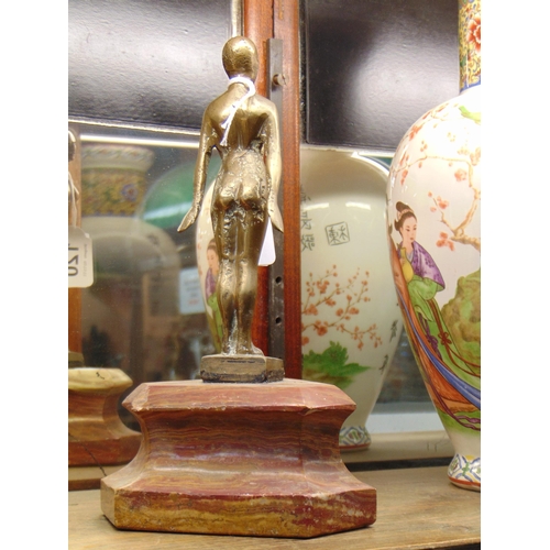 120 - Art Deco style cast brass figure on onyx base, 9.5