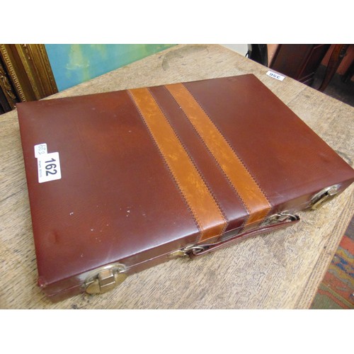 162 - Cased backgammon set.