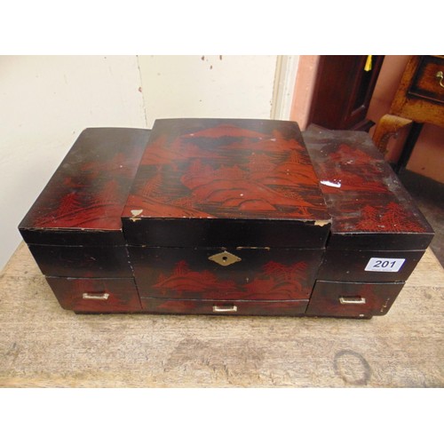 201 - Oriental lacquered musical jewellery box having fitted interior.