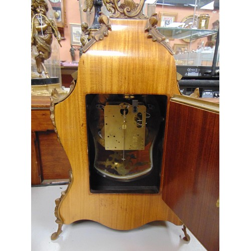 218 - Ornate continental Kingwood gilt mounted bracket clock, having Roman numerals and on shaped feet.