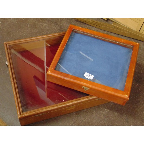 231 - Two table top display cabinets.