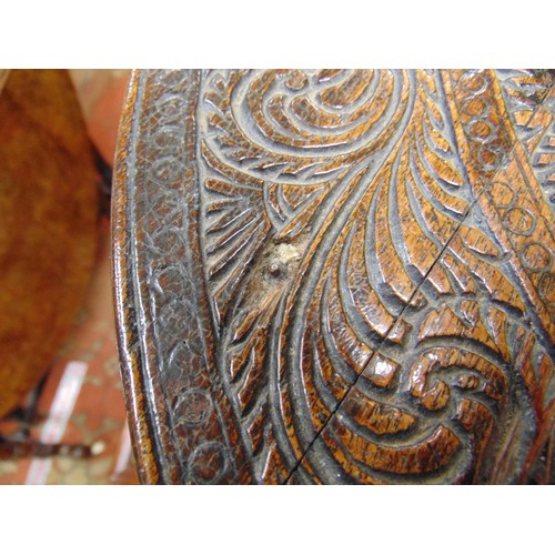 165 - Anglo Indian centre table, heavily carved with elephant head form supports, 19