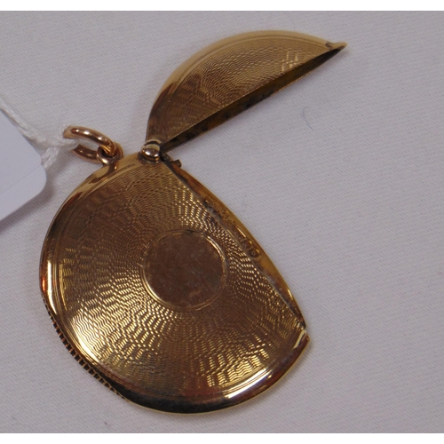 1 - Asprey 9ct gold vesta case of circular form, with engine turned decoration, 16.3g.