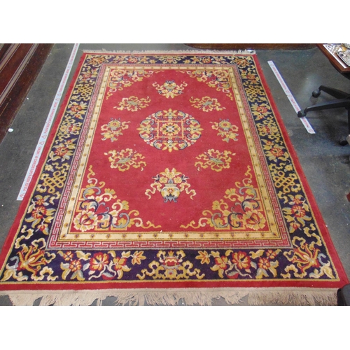 108 - Red ground floral carpet, 90 x 67