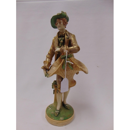 2 - Imperial Amphora porcelain figure of a man with basket, impressed marks, 14.5