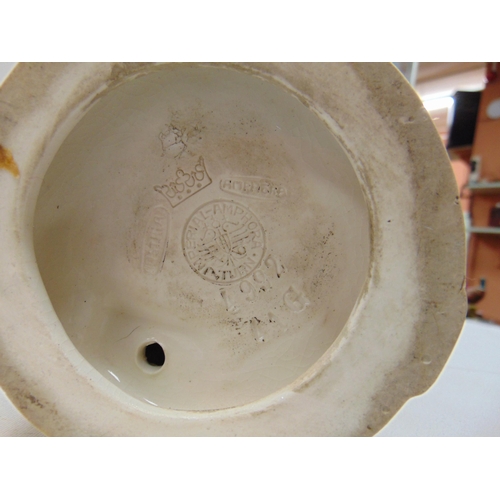 2 - Imperial Amphora porcelain figure of a man with basket, impressed marks, 14.5