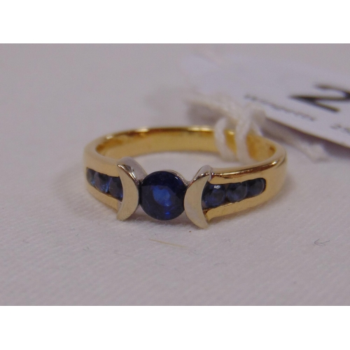 25 - Contemporary 18ct gold sapphire set ring, size S, 5.7g.