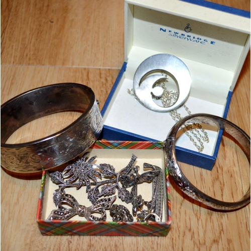 34 - Two silver bangles, various silver and marcasite jewellery etc.
