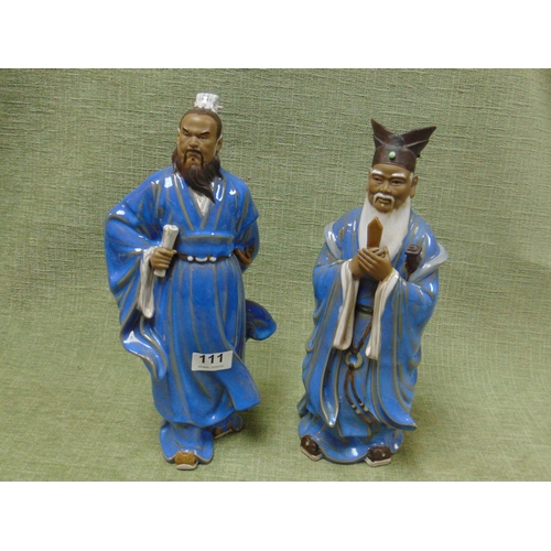 111 - Pair of Oriental glazed terracotta figures, 14