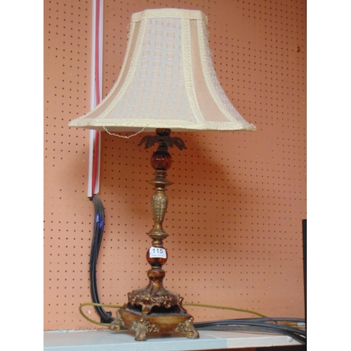 115 - Ornate table lamp and shade.