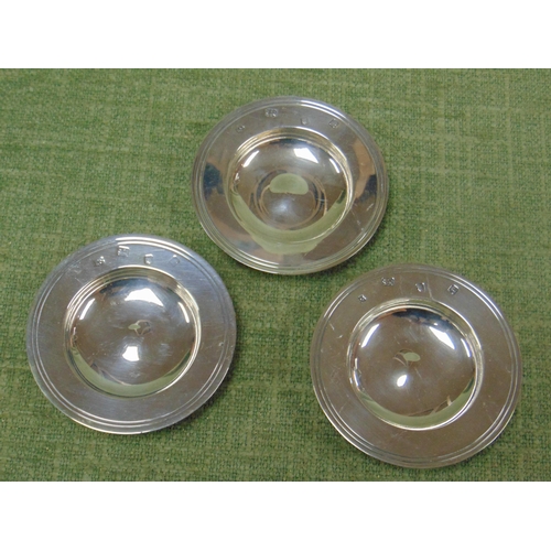 14 - Three circular silver pin trays, 3.25