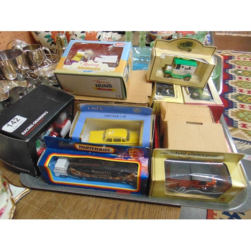 142 - Various boxed collectable scale model vehicles.